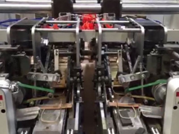 Машина для производства бумажных пакетов с кручеными ручками