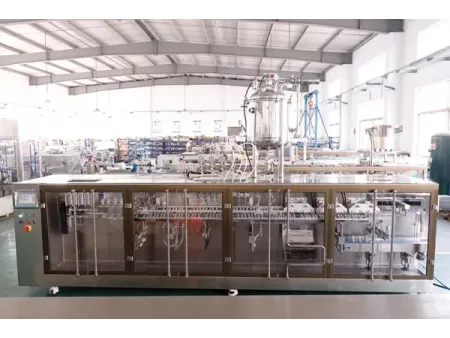 Машина для фасовки в готовые фигурные пауч-пакеты с четырьмя дозирующими головками