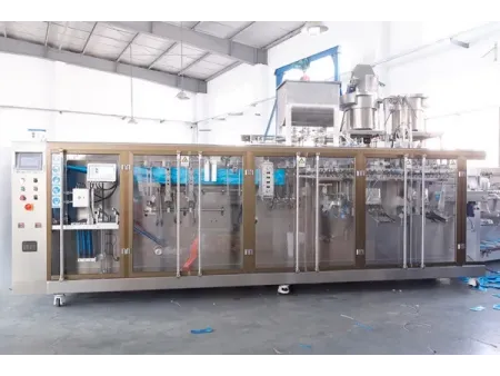 Горизонтальная фасовочно-упаковочная машина для пауч-пакетов со штуцером с одной дозирующей головкой (HFFS)